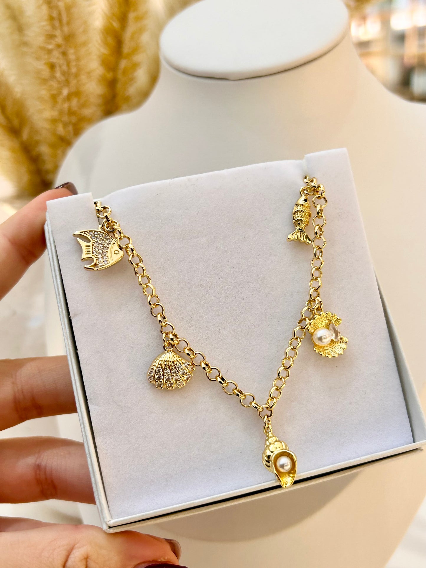 
                  
                    Nerina Charm Necklace
                  
                