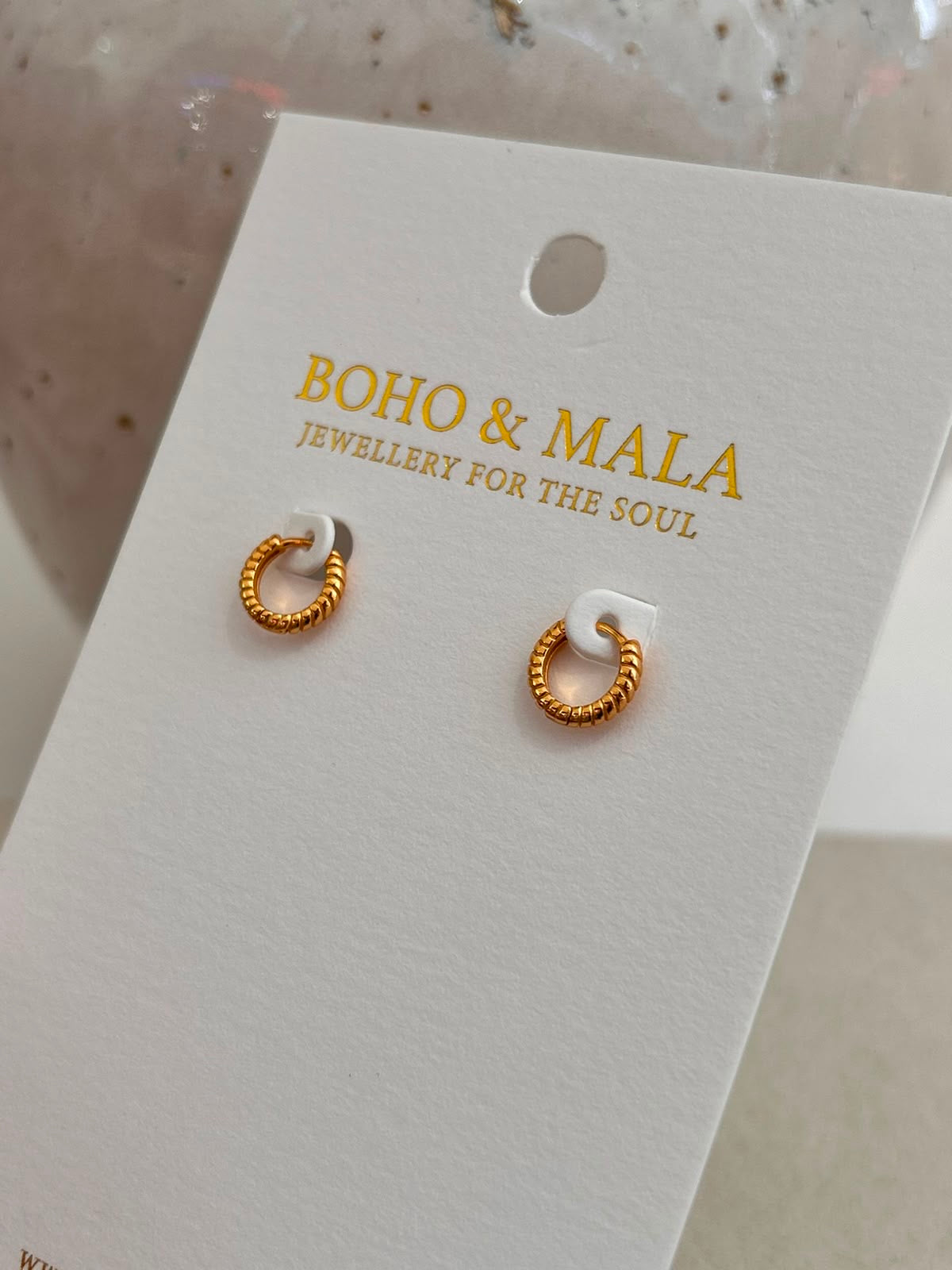 
                  
                    Sienna Rope Gold Huggie Earrings
                  
                