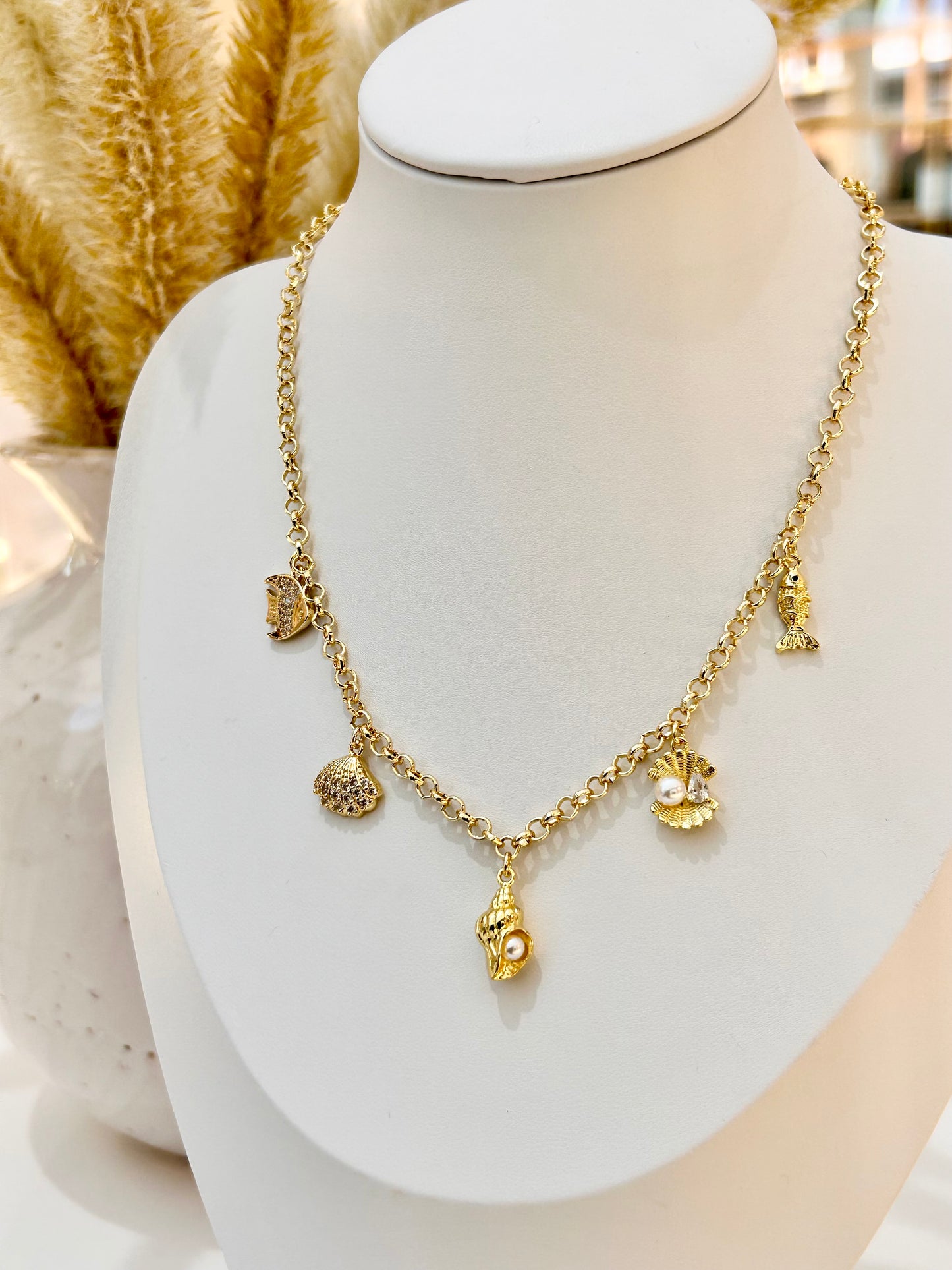 
                  
                    Nerina Charm Necklace
                  
                