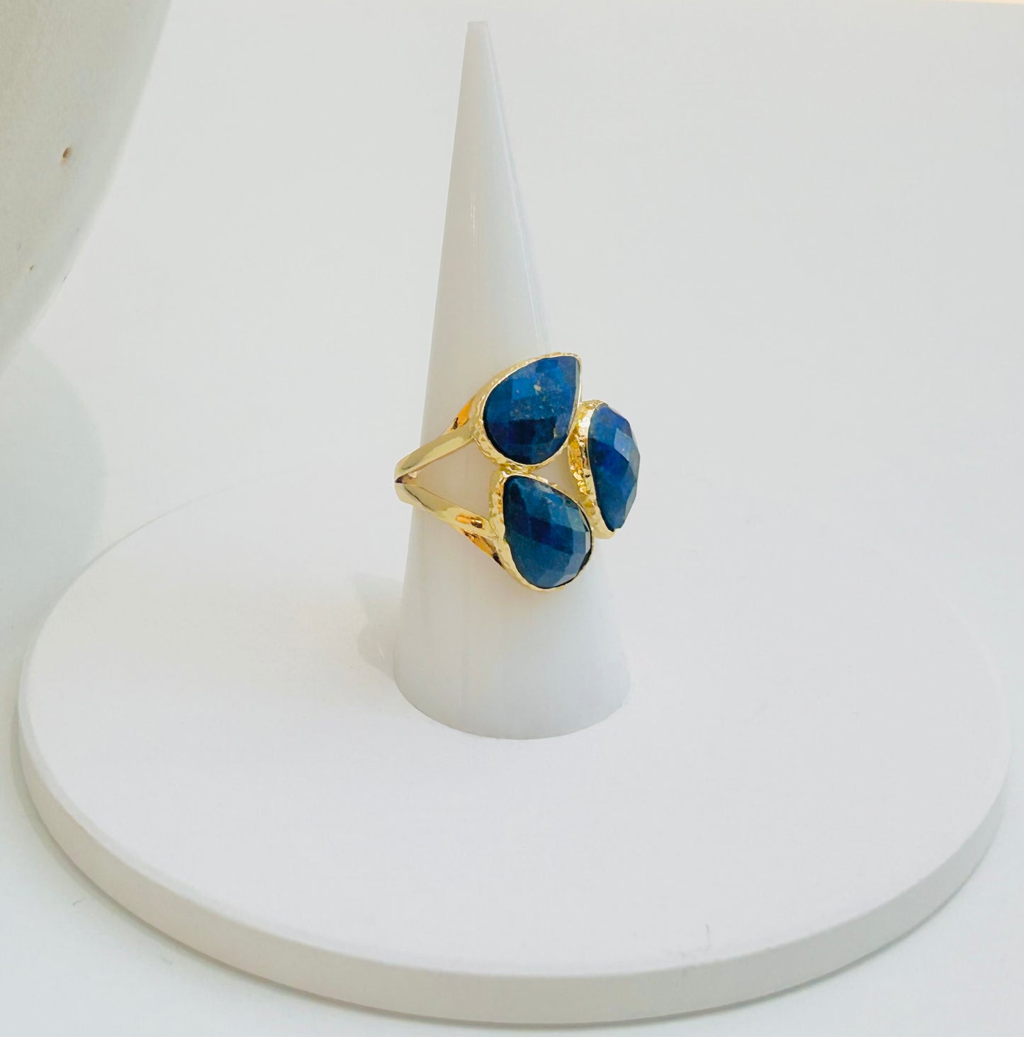 
                  
                    Seraphine Lapis Lazuli Statement Ring by Boho & Mala displayed on a white jewellery stand.
                  
                