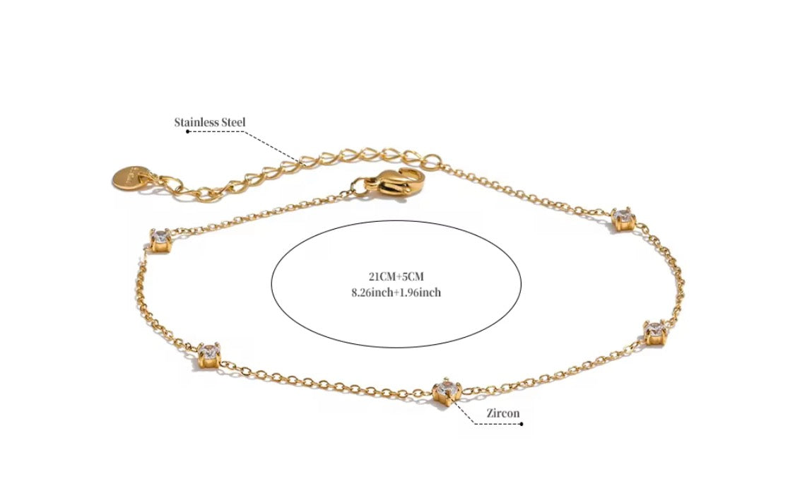
                  
                    Close-up of the Dainty Crystal Drop Gold Bracelet
                  
                