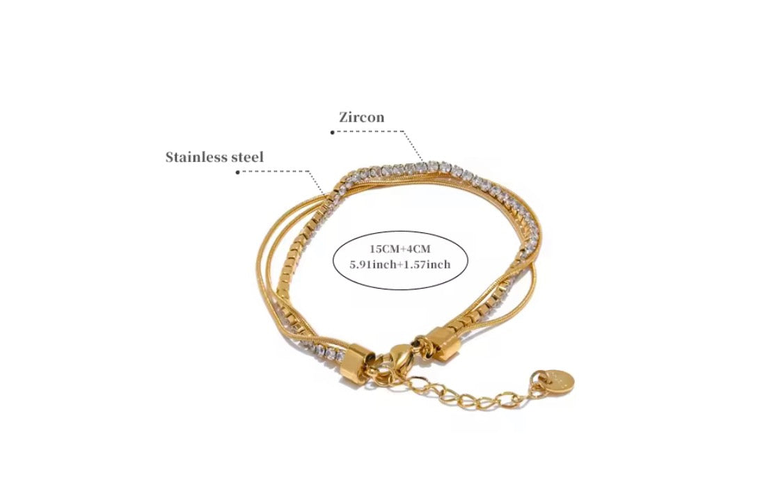 
                  
                    Golden Glow Stack Bracelet displayed on a white stand
                  
                