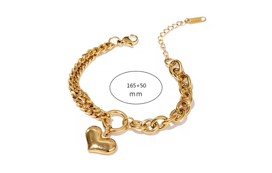 
                  
                    Close-up of the Coeur Gold Heart Chain Bracelet
                  
                