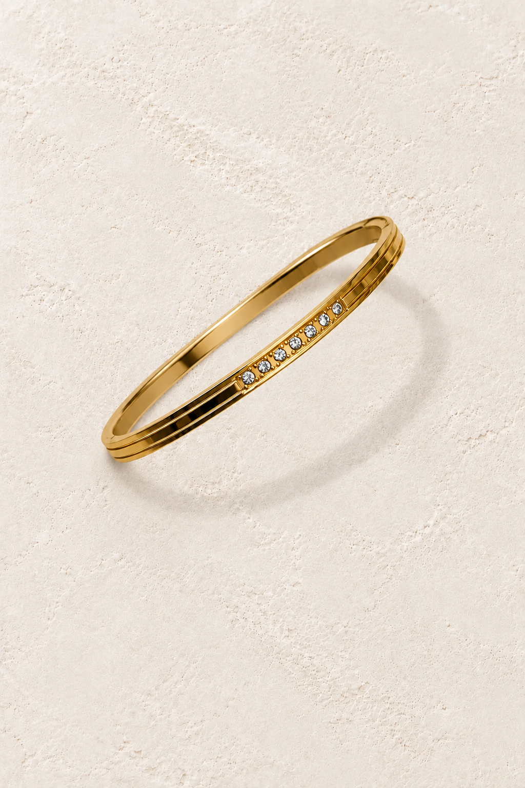 
                  
                    Elira Gold Triple Line Crystal Bangle
                  
                