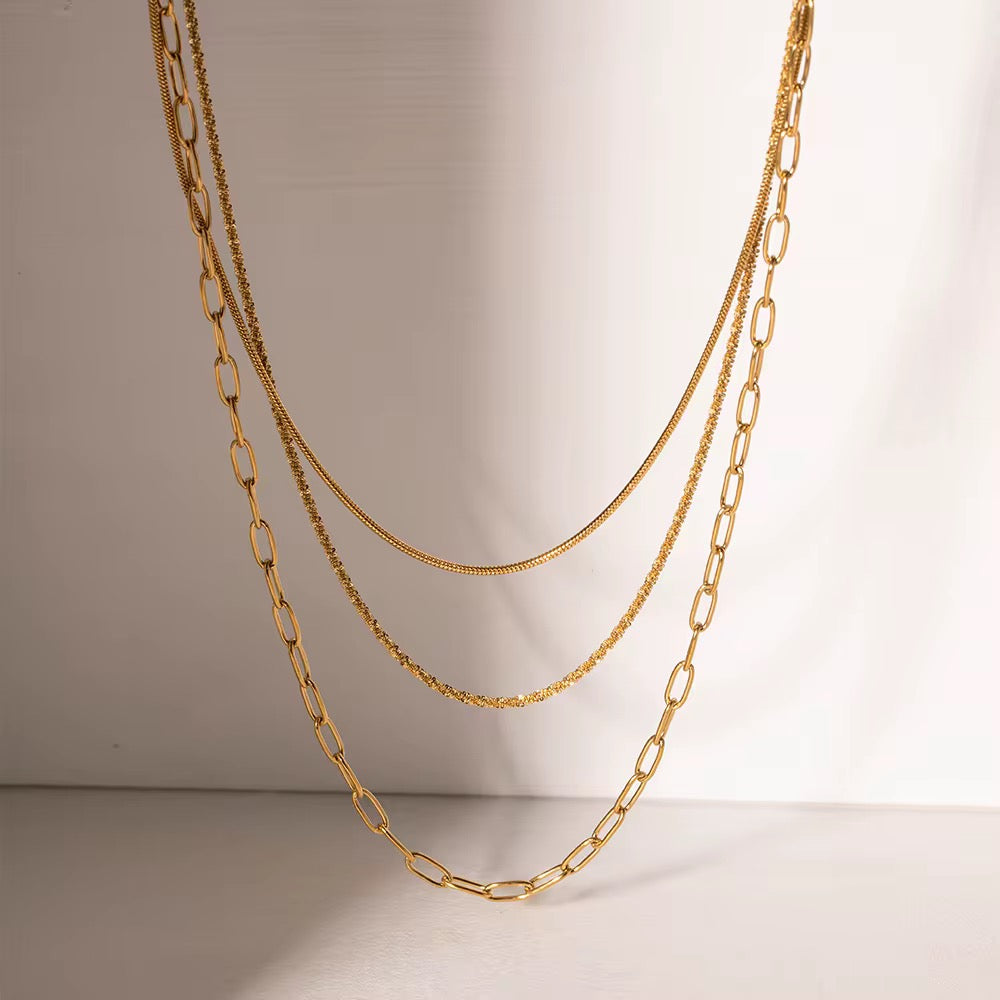 
                  
                    Sorrento Triple Layer Chain Necklace – Waterproof Gold-Plated Stainless Steel
                  
                