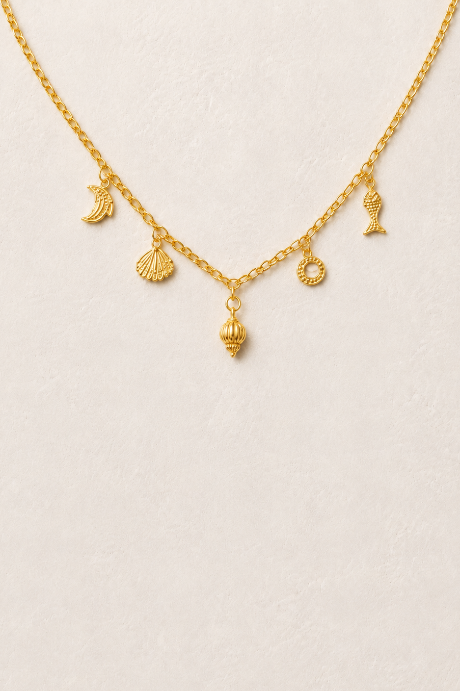 Under The Sea Charm Necklace with gold shell, starfish and pearl charms
