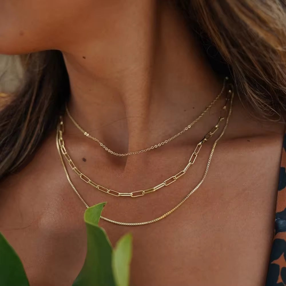 
                  
                    Amara Triple Layer Chain Necklace – Waterproof Gold-Plated Stainless Steel
                  
                