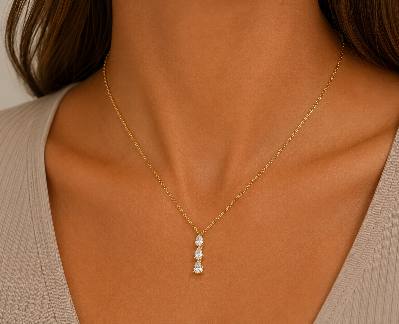 
                  
                    Amara Triple Zirconia Drop Necklace – Waterproof Gold-Plated Stainless Steel
                  
                