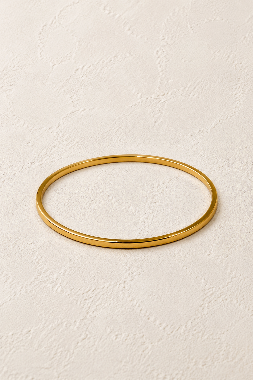 Serenelle Slim Polished Gold Bangle – waterproof gold bangle by Boho & Mala