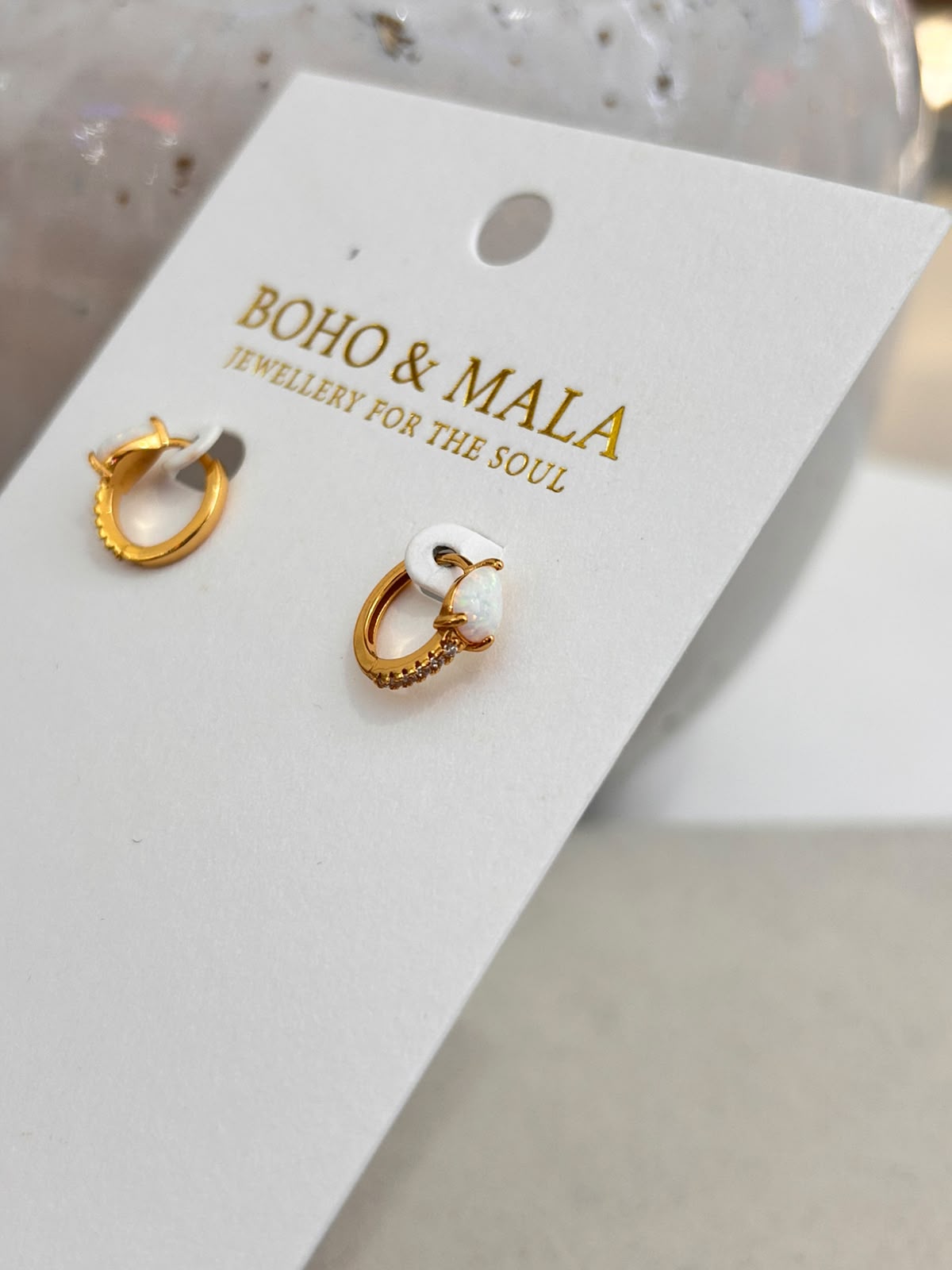 
                  
                    Opal Huggie Hoop Earrings
                  
                