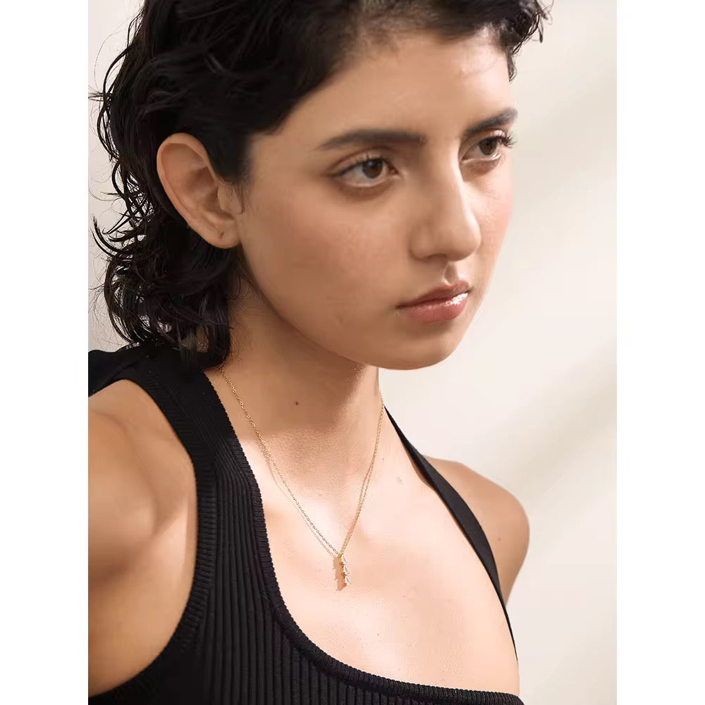 
                  
                    Amara Triple Zirconia Drop Necklace – Waterproof Gold-Plated Stainless Steel
                  
                
