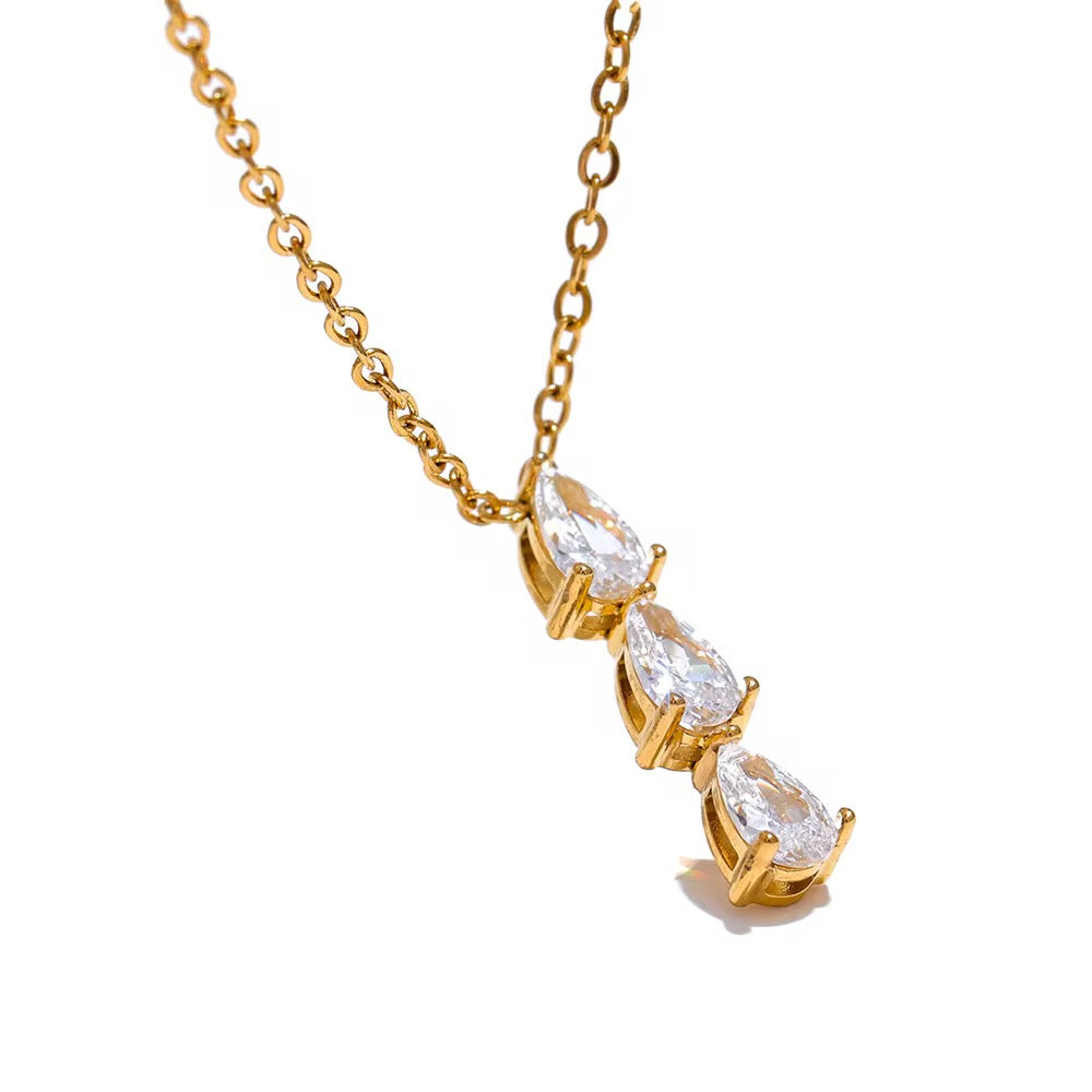 
                  
                    Amara Triple Zirconia Drop Necklace – Waterproof Gold-Plated Stainless Steel
                  
                