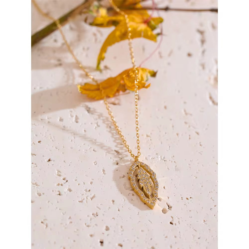 
                  
                    Solene Crystal Leaf Necklace – Dainty Gold Pendant Necklace
                  
                