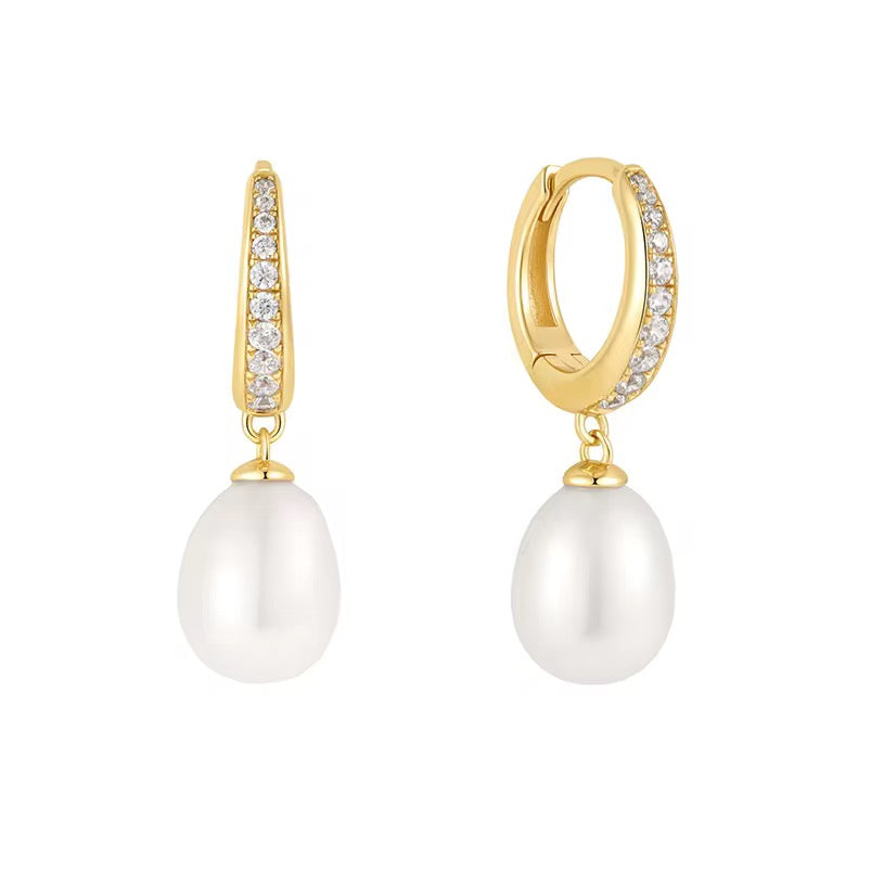 
                  
                    Pearl Lumière Hoop Earrings – Sterling Silver, Gold Plated & Genuine Freshwater Pearl
                  
                