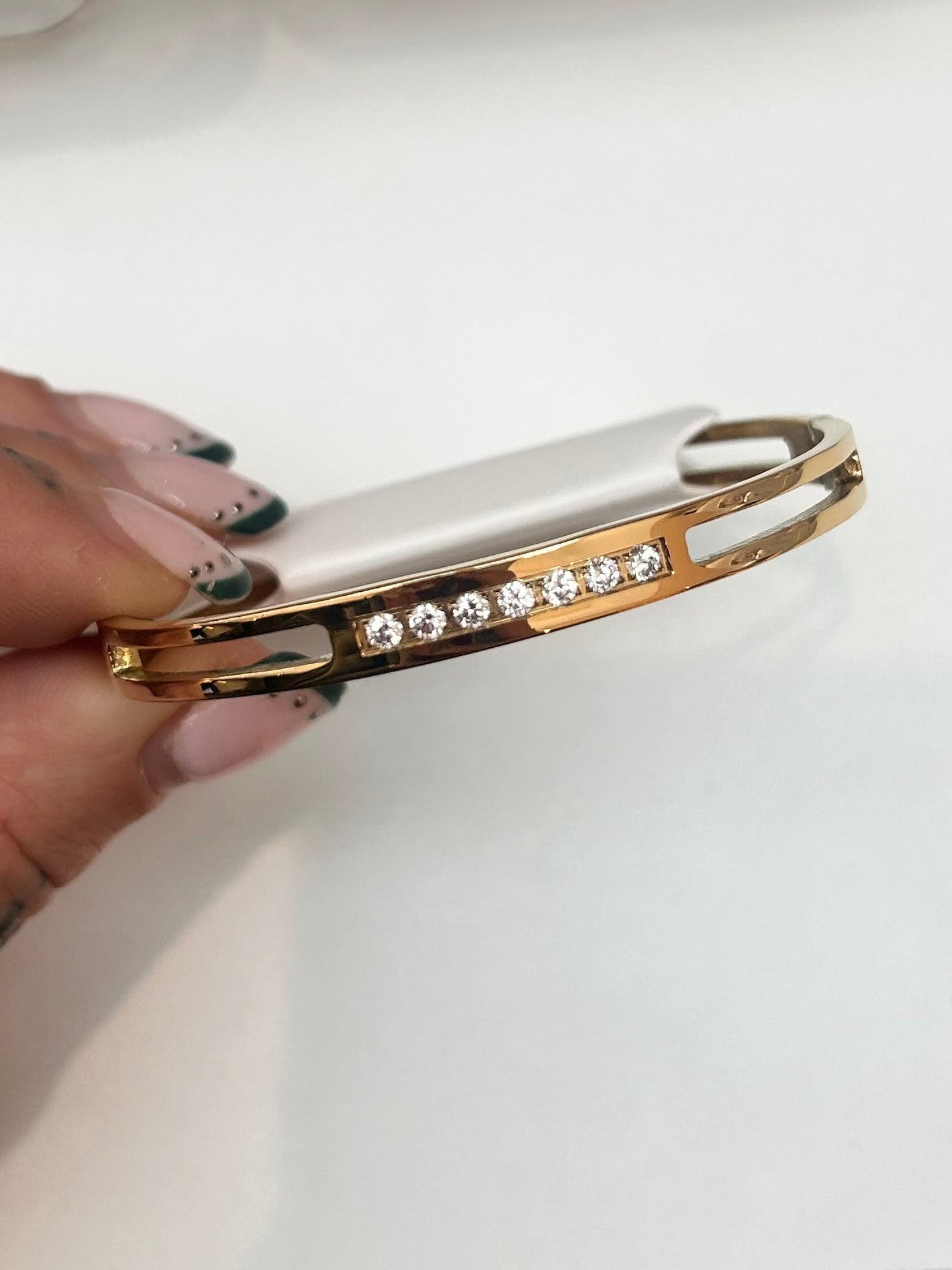 
                  
                    Elira Gold Double Row Crystal Bangle — original display photo
                  
                