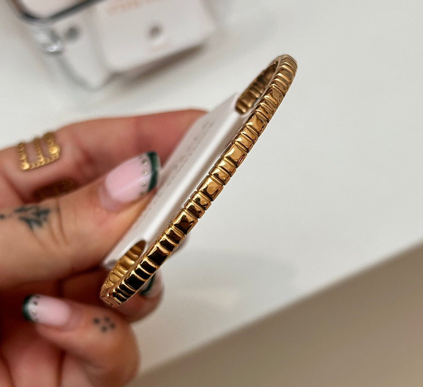 
                  
                    Talia Gold Textured Bangle — original display photo
                  
                