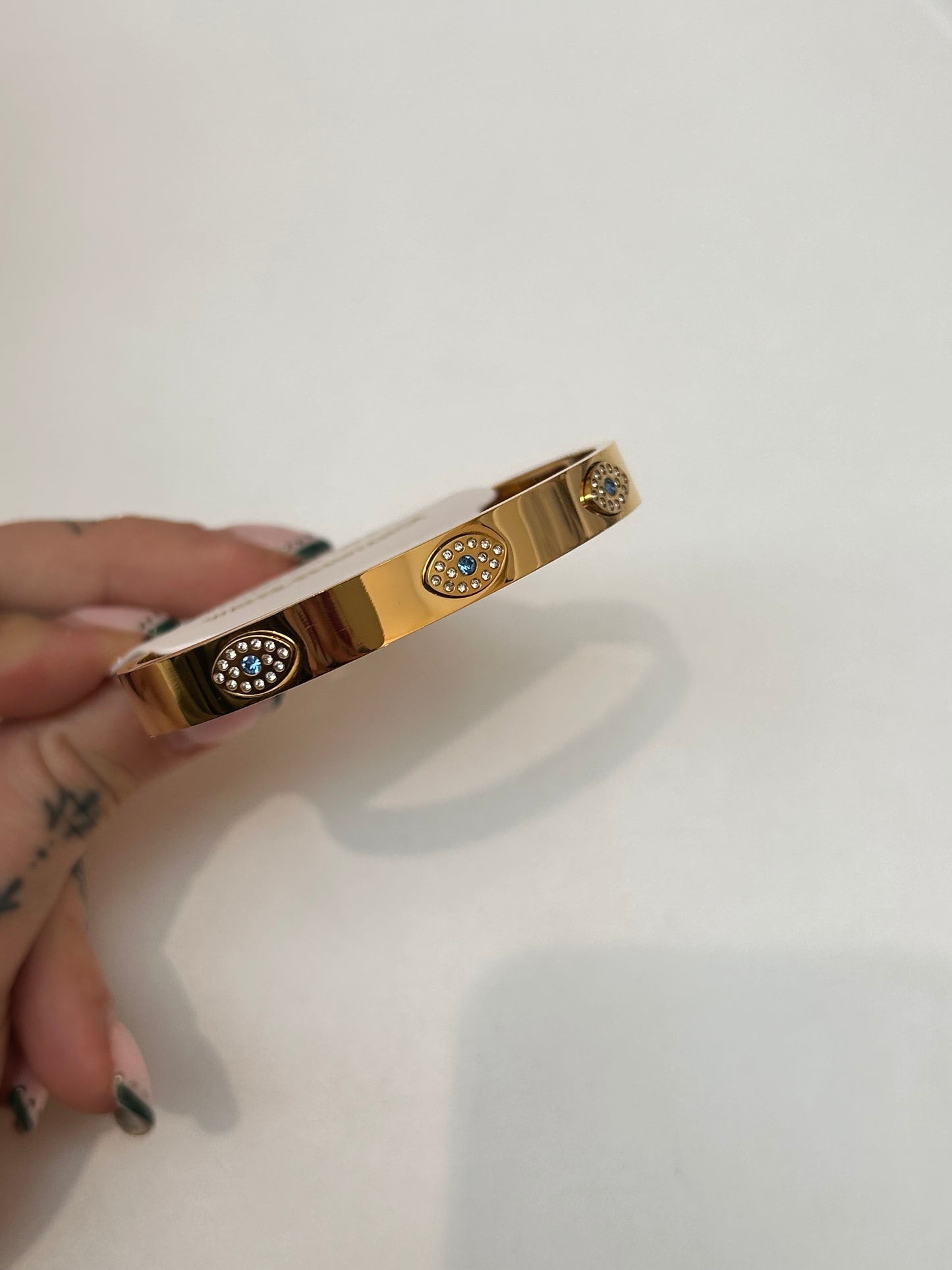
                  
                    Zaria Gold Evil Eye Bangle – Boho & Mala jewellery
                  
                