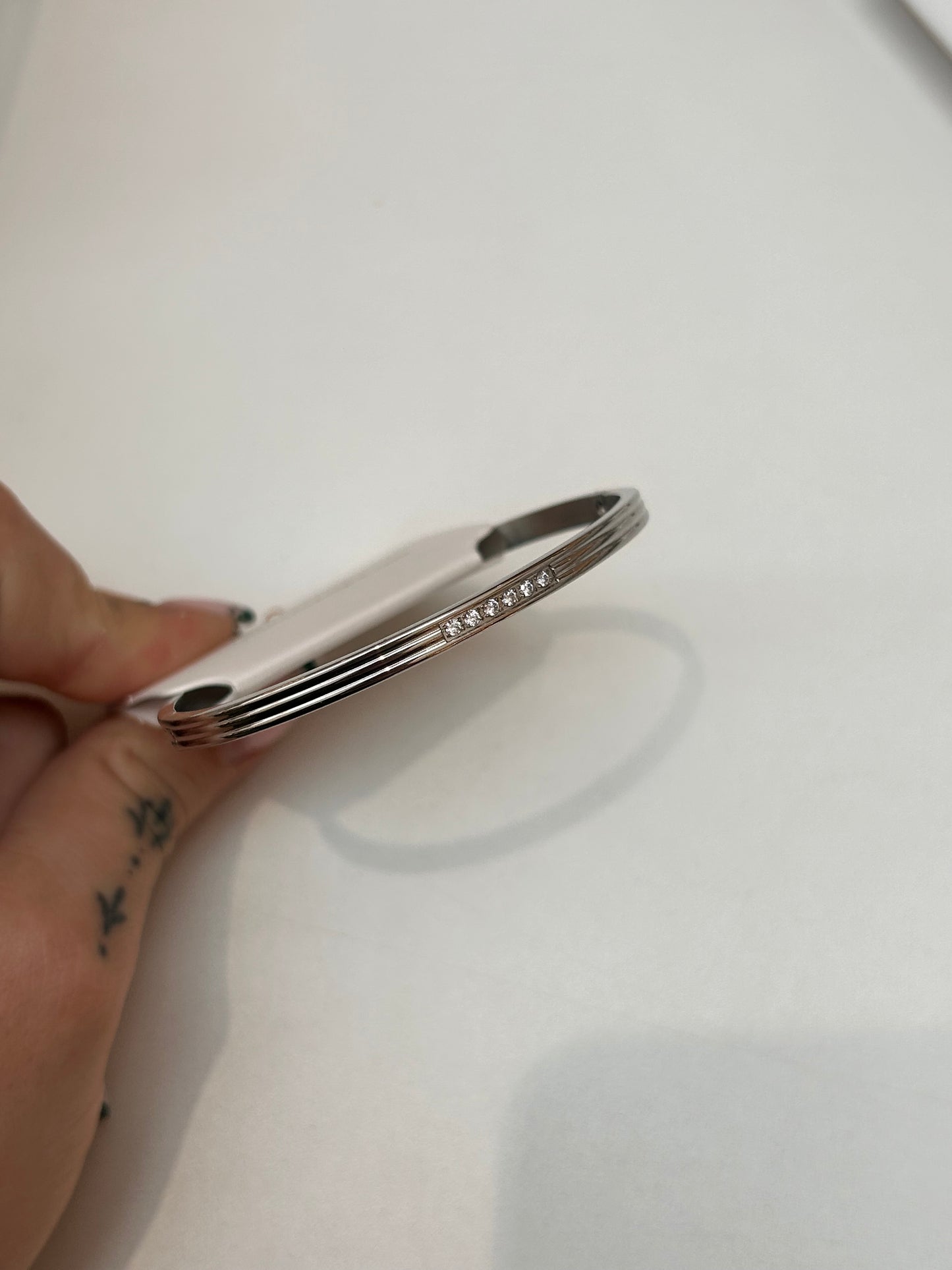 
                  
                    Elira Silver Triple Line Crystal Bangle – Boho & Mala jewellery
                  
                