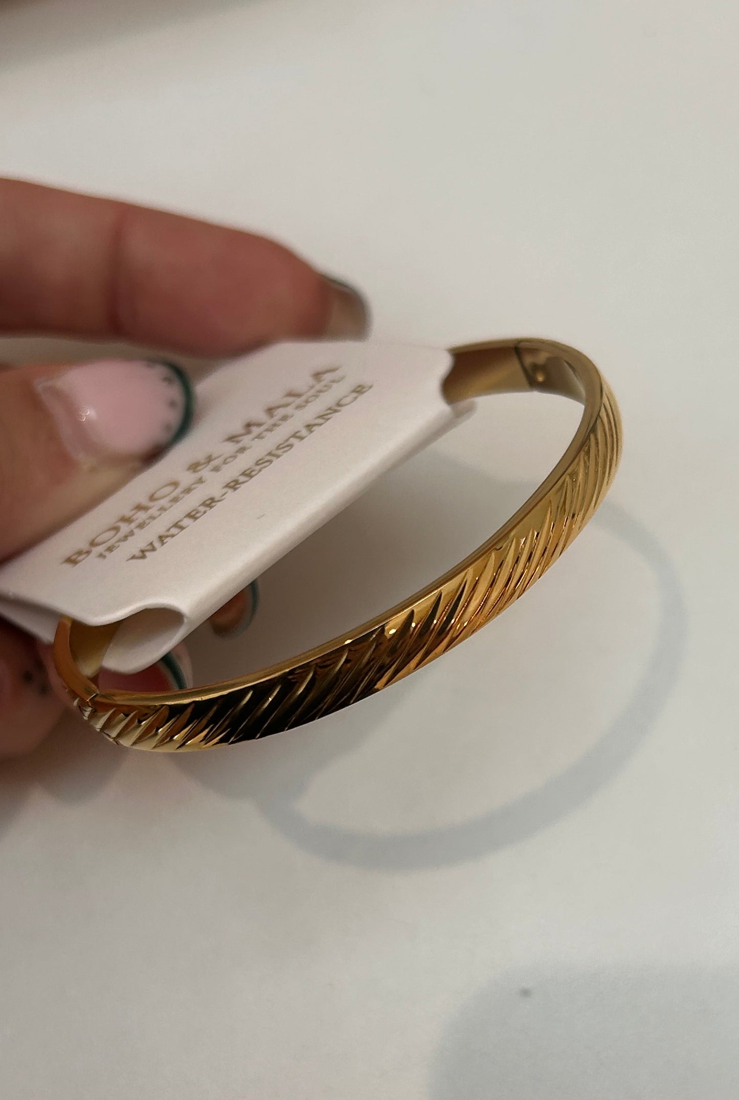 
                  
                    Oriana Gold Sculpted Twist Bangle – Boho & Mala jewellery
                  
                