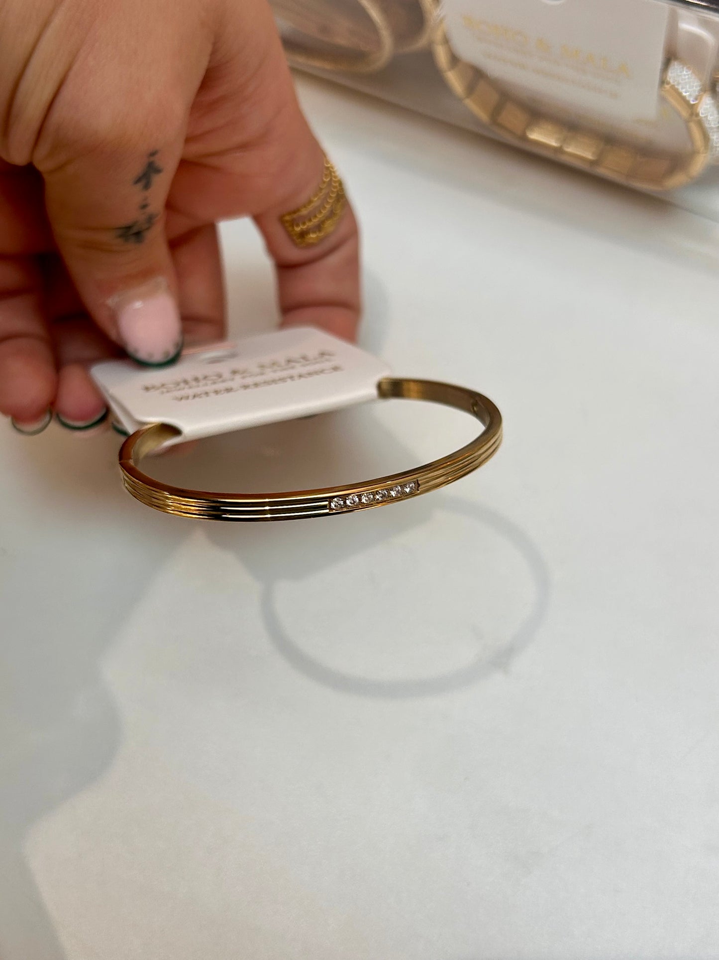 
                  
                    Elira Mini Gold Triple Line Crystal Bangle – Boho & Mala jewellery
                  
                