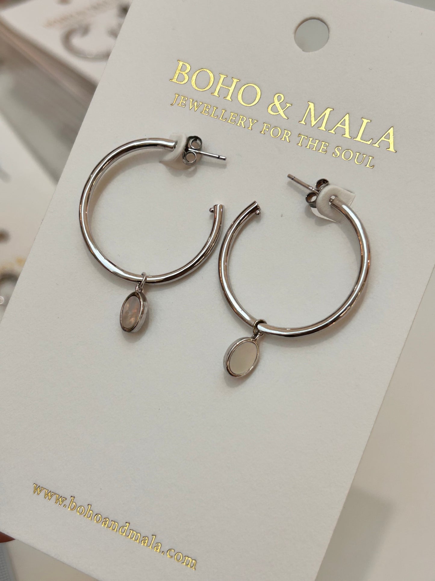 
                  
                    Liora Silver Oval Charm Hoop Earrings
                  
                