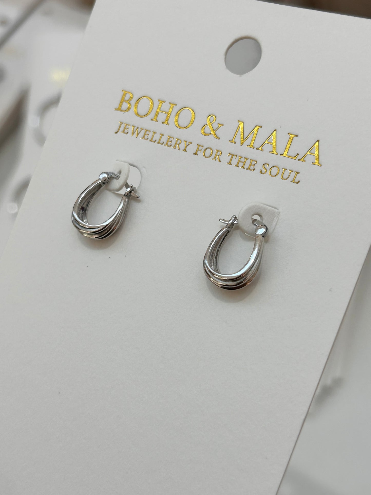 
                  
                    Avora Silver Sculpted Teardrop Hoop Earrings
                  
                