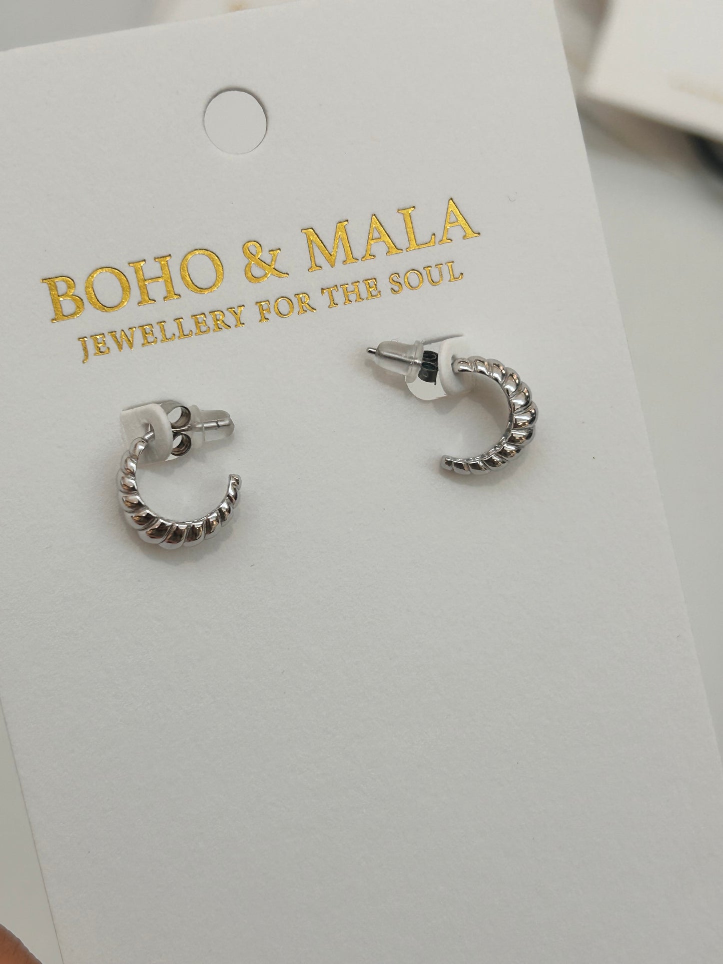 
                  
                    Lucette Silver Rope Hoop Earrings
                  
                