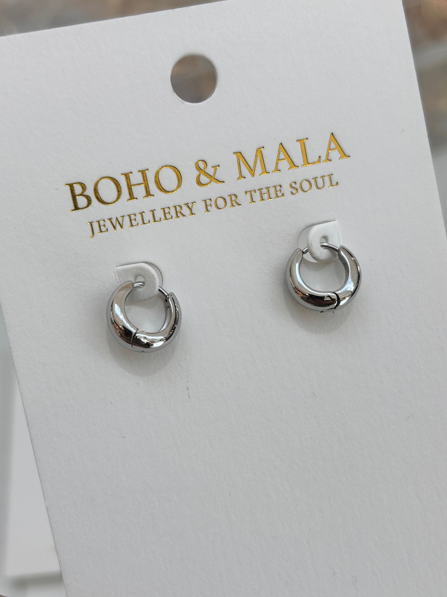 
                  
                    Maelle Silver Chunky Hoop Earrings
                  
                