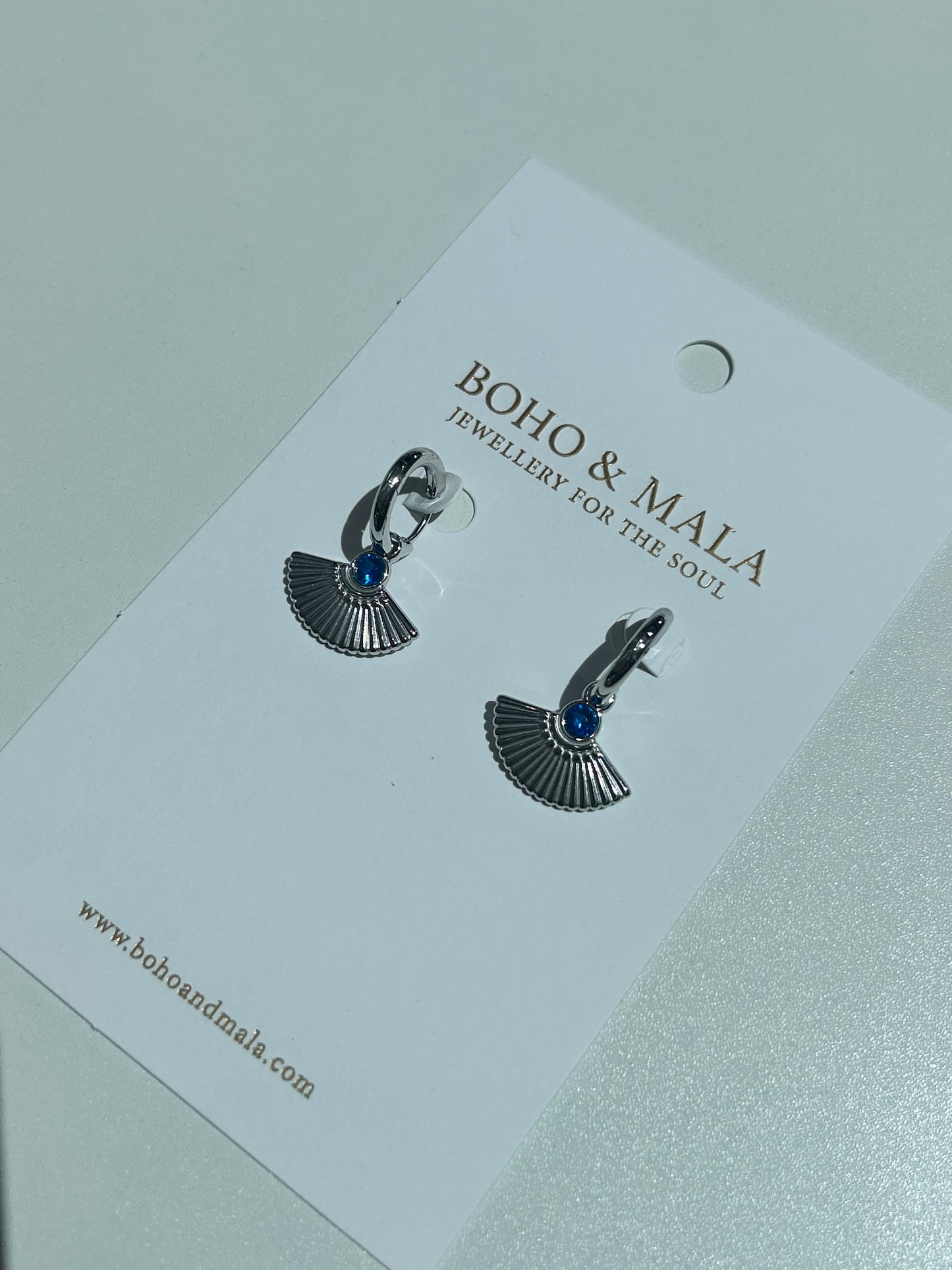 
                  
                    Azura Silver Blue Fan Drop Earrings
                  
                