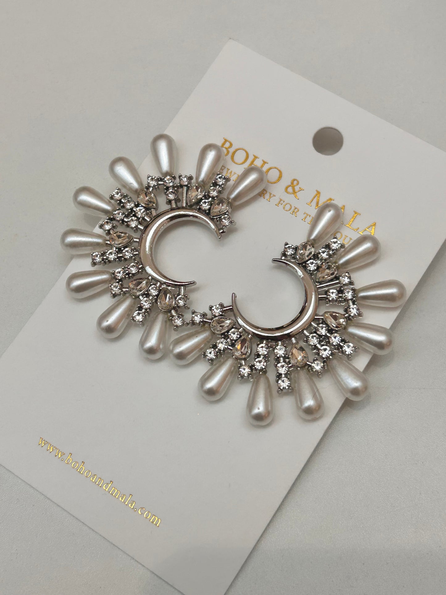 
                  
                    Isadora Silver Pearl & Crystal Crescent Earrings
                  
                