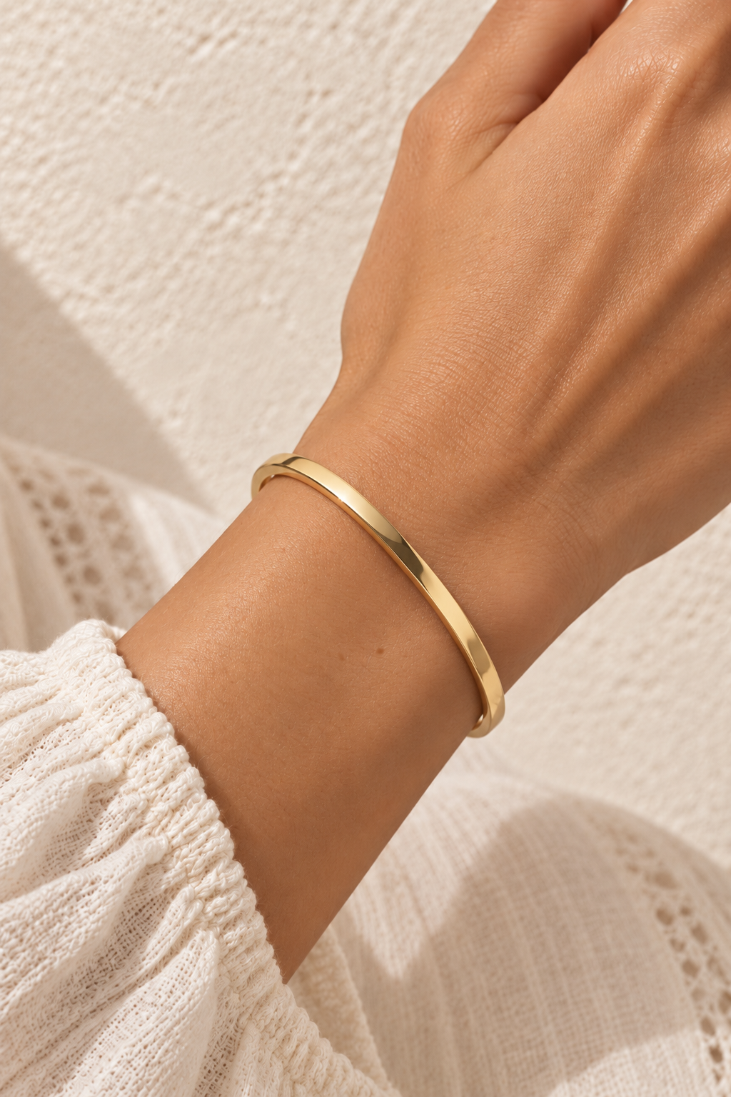 
                  
                    Elira Gold Row Bangle
                  
                