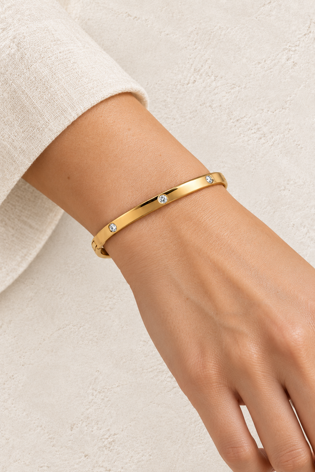 Model wearing Amelie Gold Crystal Station Bangle