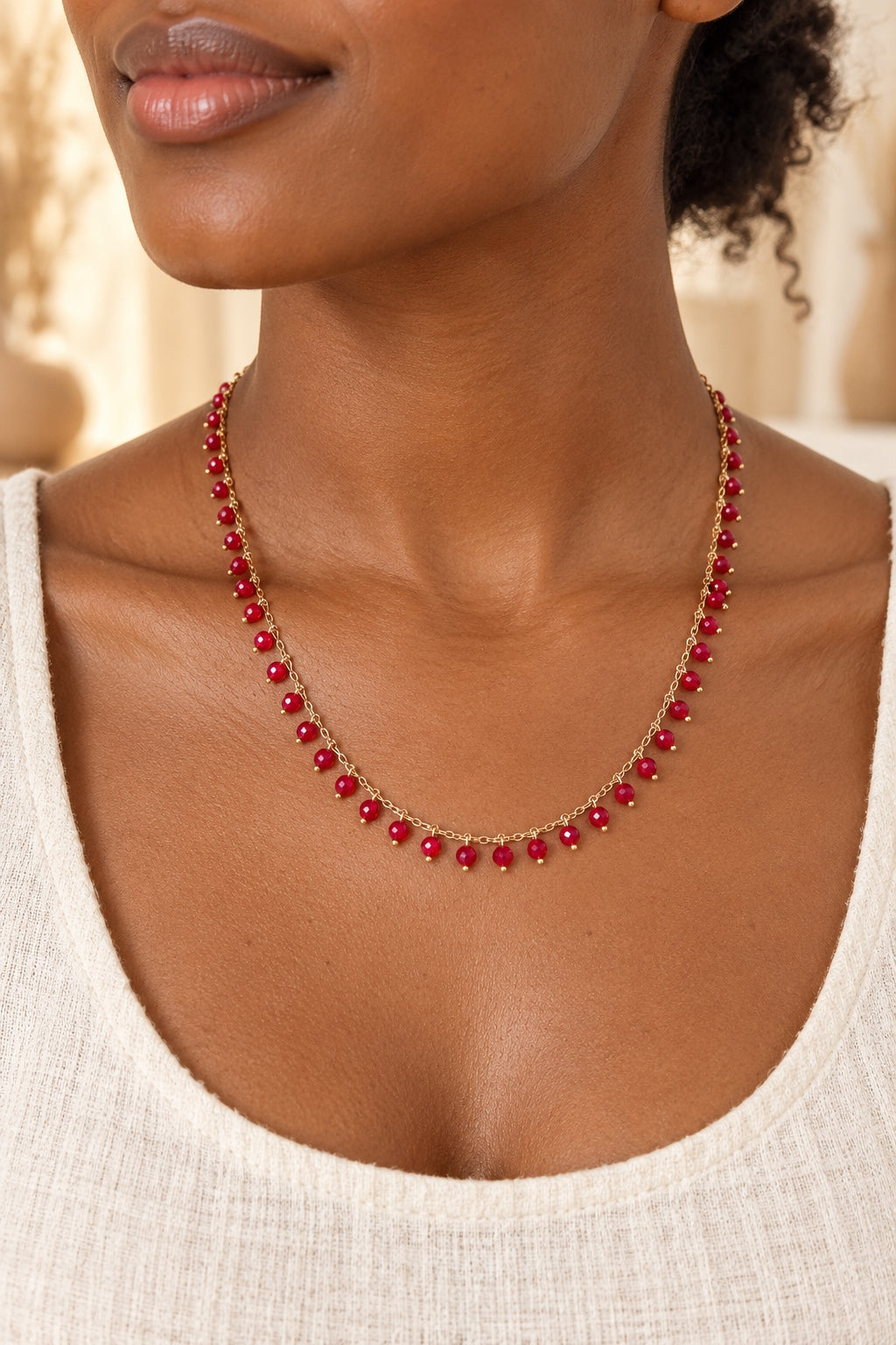 
                  
                    Model wearing the Ariella Red Jade gemstone drop necklace
                  
                
