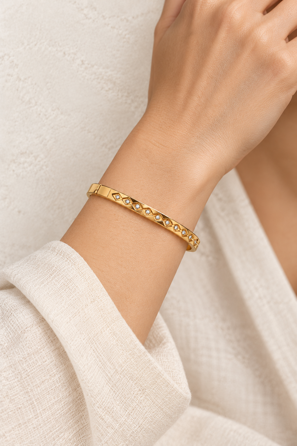 
                  
                    Model wearing Aster Gold Diamond Motif Bangle
                  
                