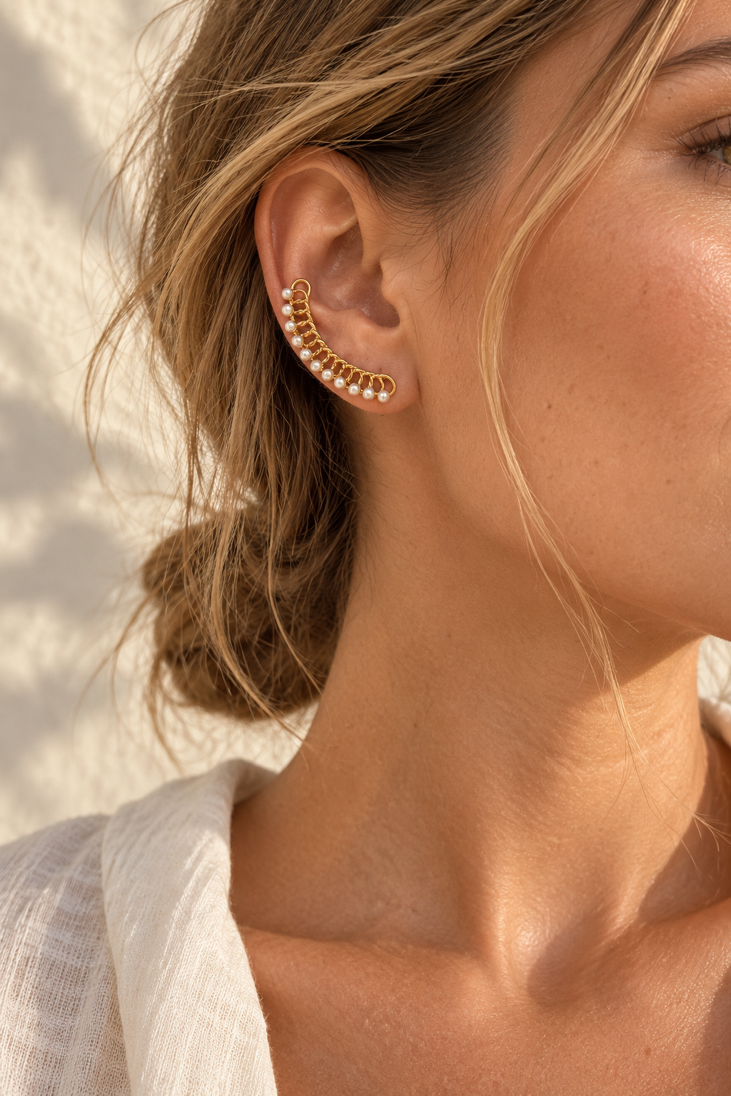 Model wearing Aurielle pearl ear climber