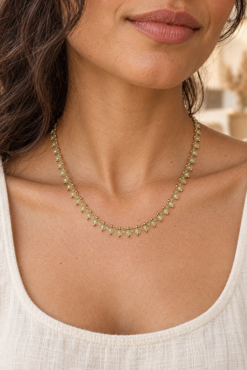 Boho model wearing the Avelora Prehnite gemstone drop necklace