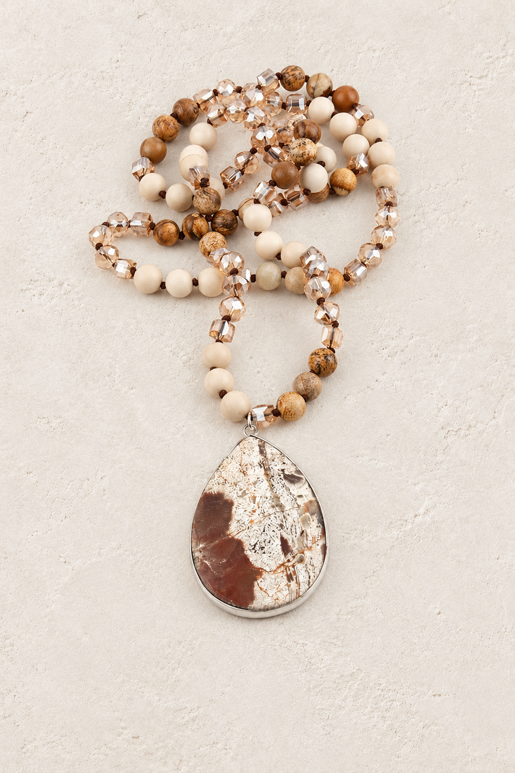 Tribal Agate Pendant Necklace on Francesca's approved original hero background