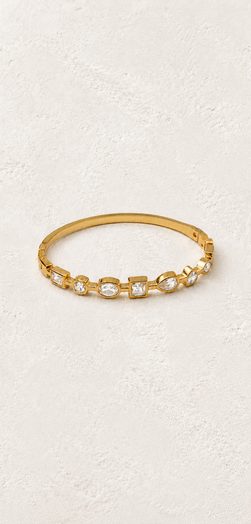 Aviora Gold Mixed-Cut Crystal Bangle on Francesca's supplied original hero background