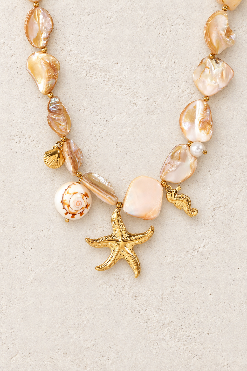 
                  
                    Marina Pearl & Starfish Necklace – Coastal Statement Necklace on Francesca's approved original hero background
                  
                
