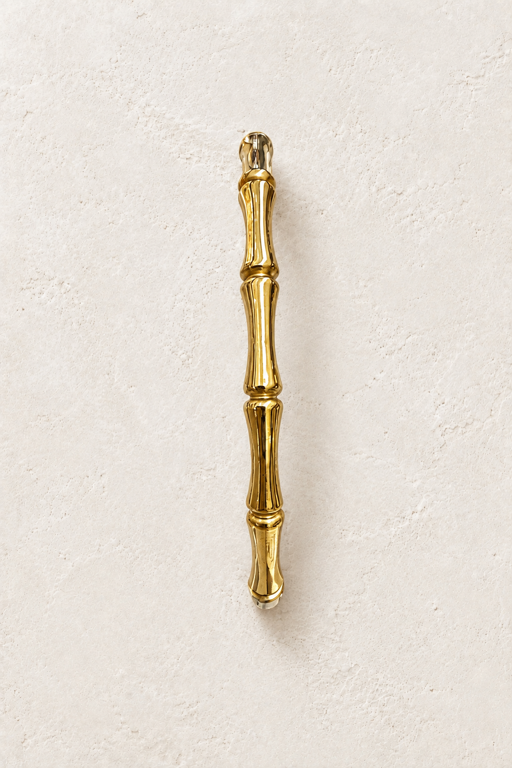 
                  
                    Gold Slim Bamboo Style Bangle | Waterproof on ivory textured background
                  
                