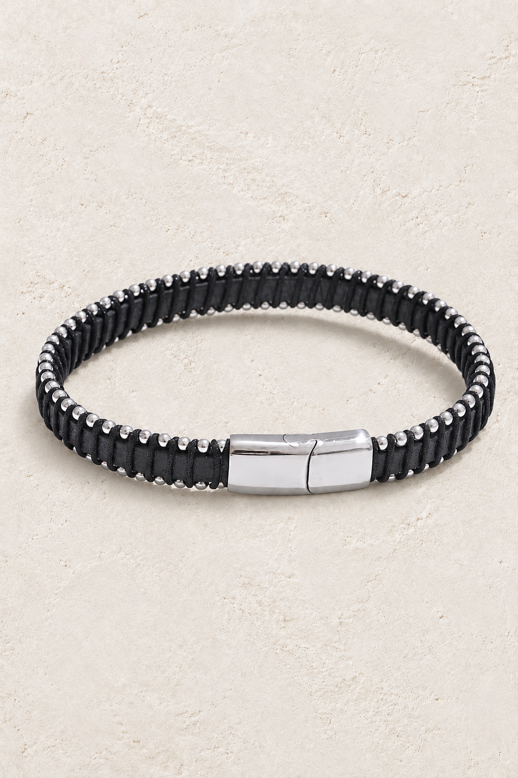 
                  
                    Men’s Black PU Leather & Stainless-Steel Bracelet 23cm on ivory textured background
                  
                