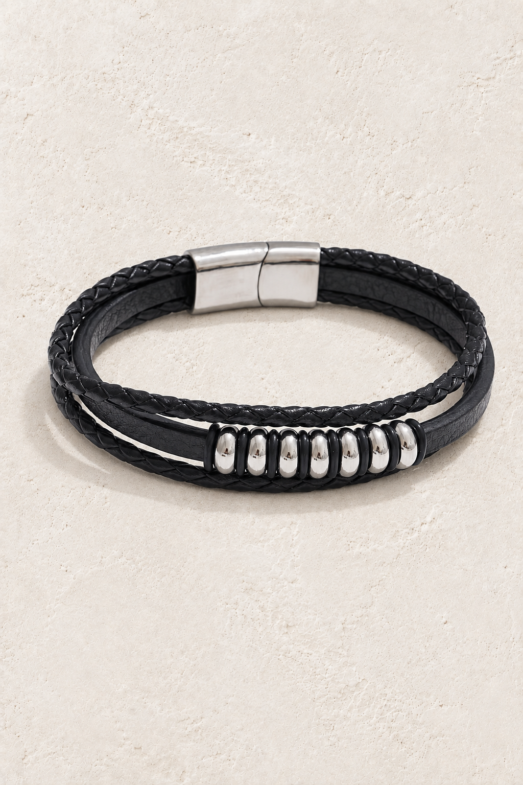 Men’s Black PU Leather & Stainless-Steel Bracelet 23cm on ivory textured background