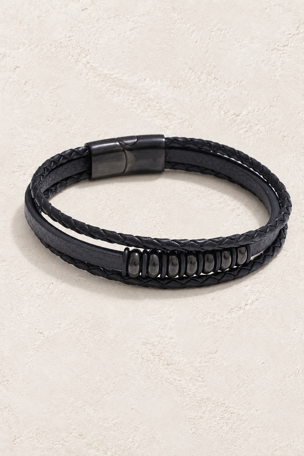 Men’s Black PU Leather & Stainless-Steel Bracelet 23cm on ivory textured background