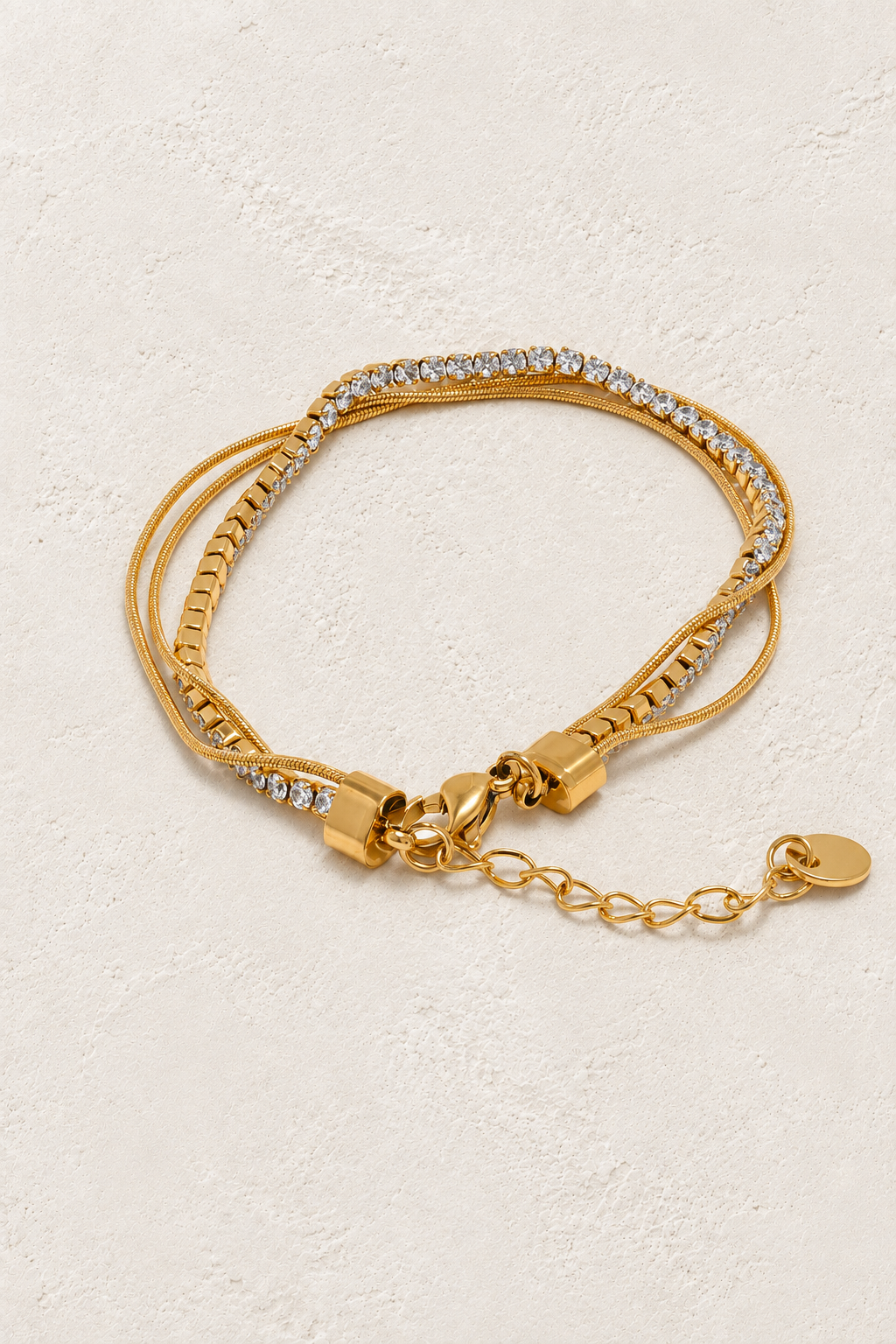 
                  
                    Golden Glow Stack Bracelet on ivory textured background
                  
                