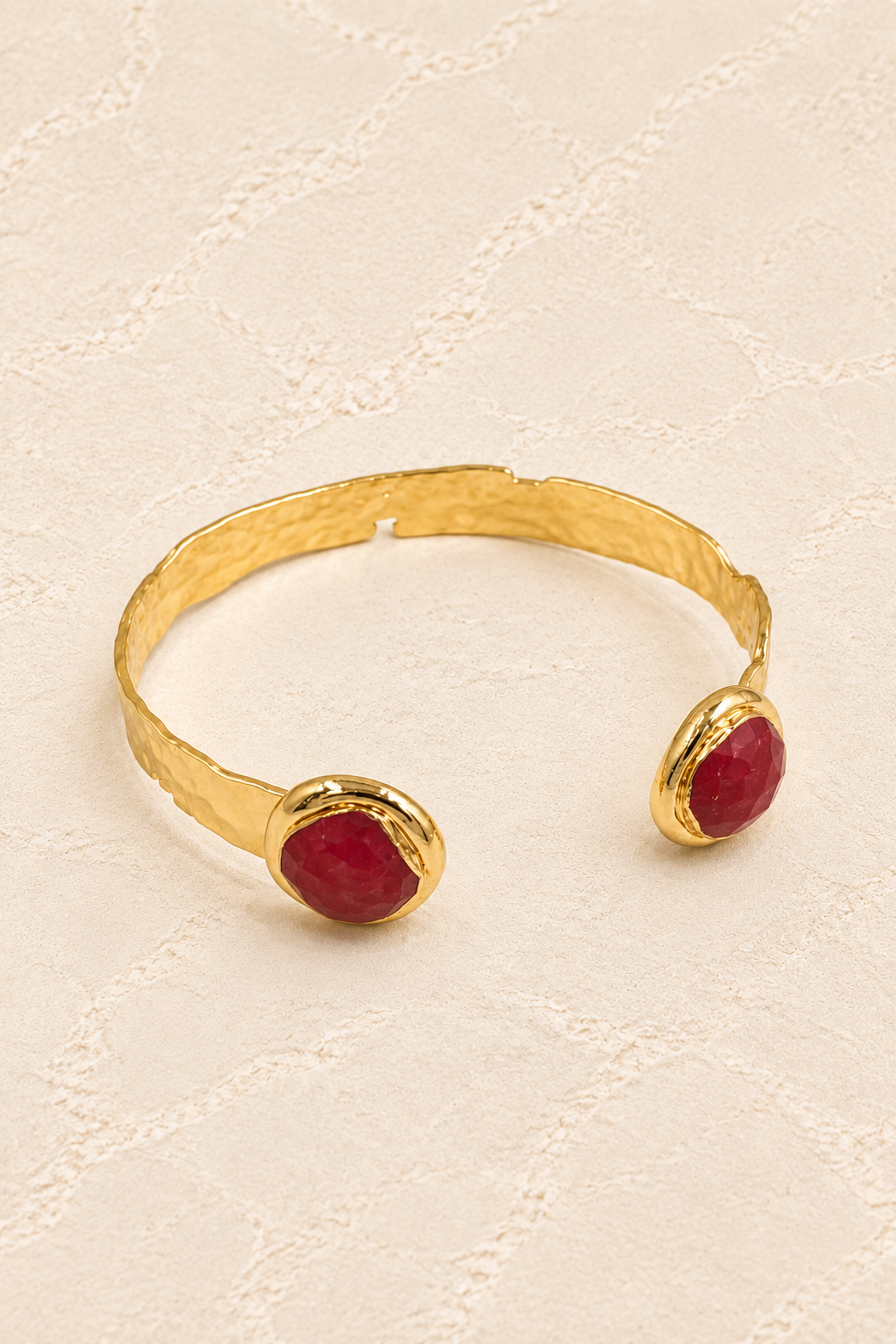 
                  
                    Red Jade Isla Cuff Bracelet on ivory plaster, tall product cover
                  
                