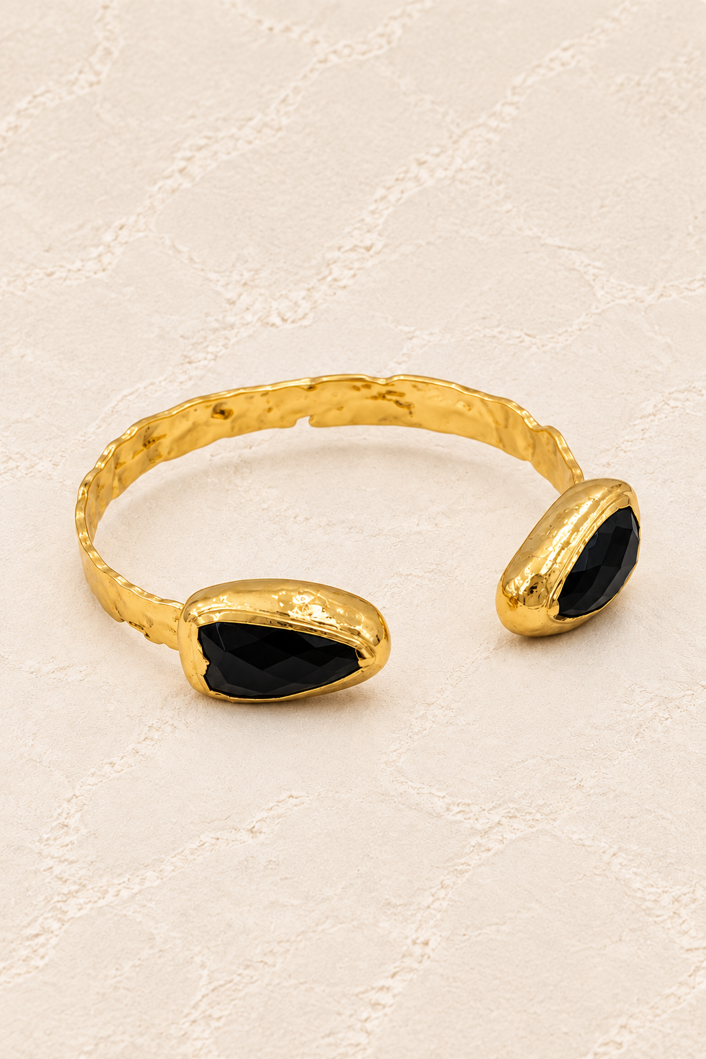 
                  
                    Coralia Black Obsidian Cuff on ivory plaster, tall product cover
                  
                
