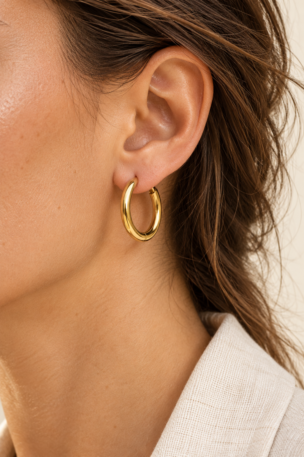 Model wearing Gold 20mm Classic Waterproof Hoop Earrings