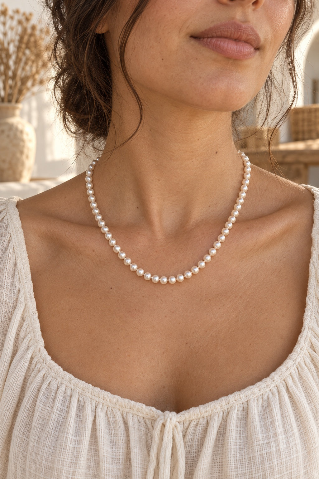 Boho model wearing the Elodie classic freshwater pearl necklace