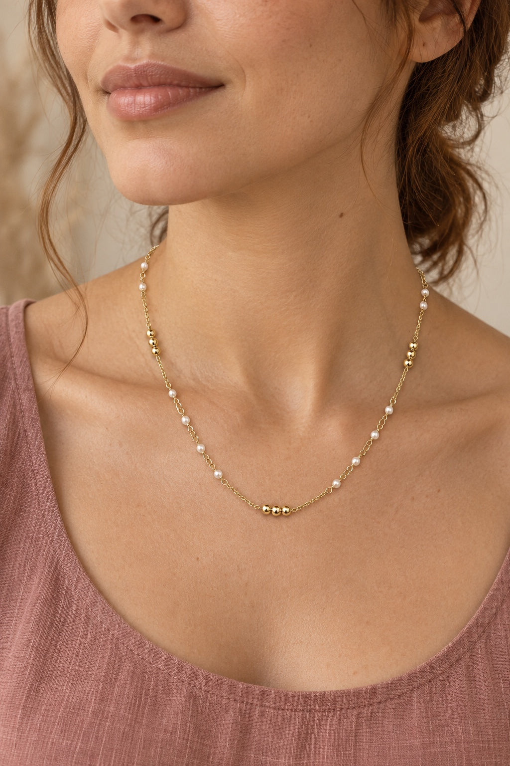 Boho model wearing the Elowira imitation pearl gold-plated necklace