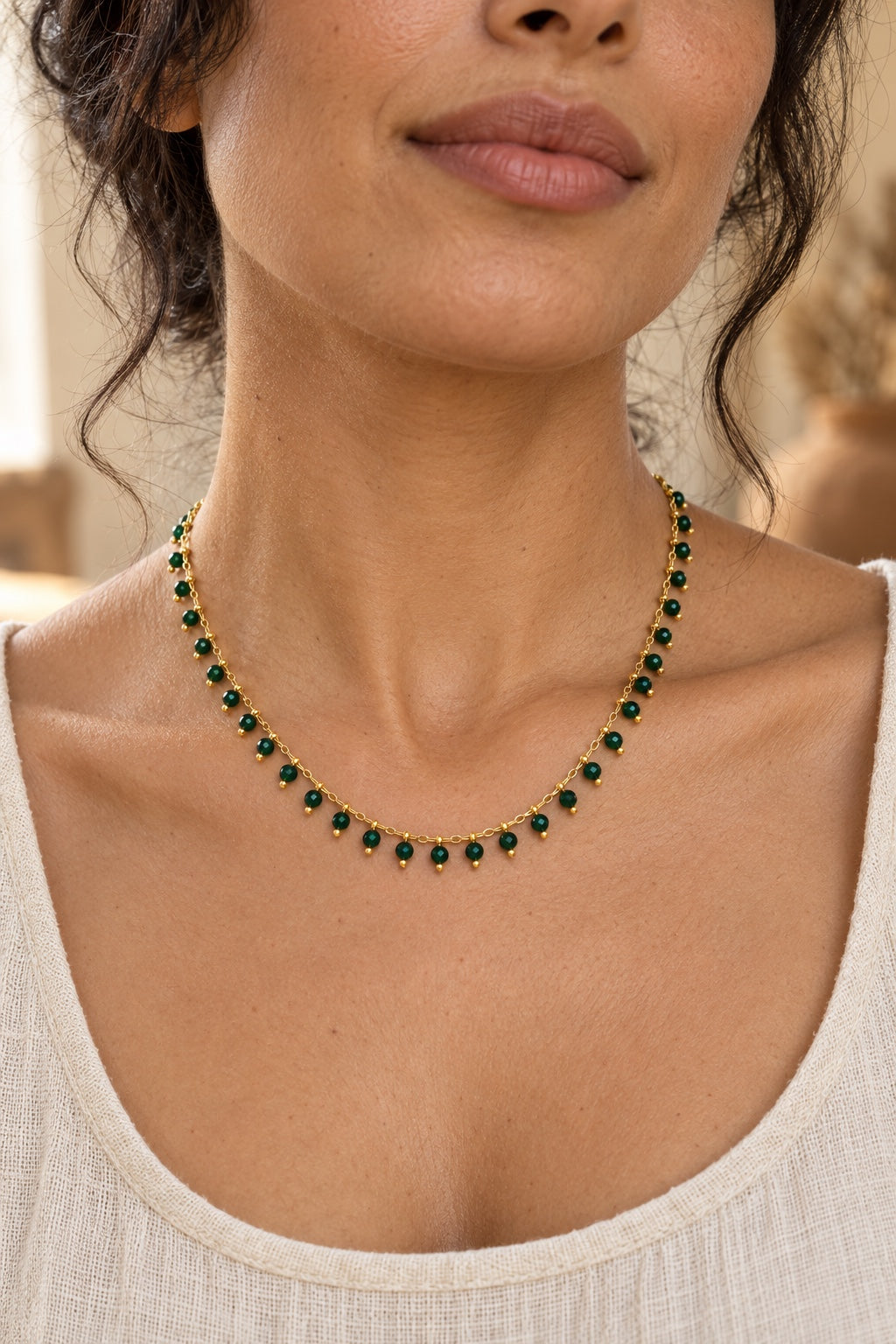 Boho model wearing the Evora Green Jade gemstone drop necklace